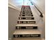 Unique stairway design mimics a subway route, adding character and charm to the home at 1042 Nelson Ave, Indianapolis, IN 46203