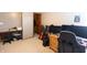 Bedroom with desk area, guitars, and closet at 1136 Meriman Dr, Greenwood, IN 46143