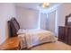 Bedroom featuring neutral tones, soft carpet, and an ornamental headboard at 1136 Meriman Dr, Greenwood, IN 46143