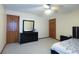 Bright bedroom with doors, ceiling fan and mirror at 1136 Meriman Dr, Greenwood, IN 46143