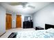 Bedroom with furniture, neutral walls and carpet, with two wood doors at 1136 Meriman Dr, Greenwood, IN 46143