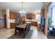 Spacious kitchen with wood cabinets, stainless steel appliances, and a breakfast nook at 1136 Meriman Dr, Greenwood, IN 46143