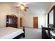 Bright bedroom with light walls, neutral carpet, wood accents, and good light at 1136 Meriman Dr, Greenwood, IN 46143