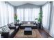 Cozy sunroom with comfortable seating and large windows offering plenty of natural light at 1136 Meriman Dr, Greenwood, IN 46143