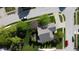 Overhead shot highlighting a home with mature trees, a backyard patio, and neatly maintained landscaping at 1232 Severn Ct, Greenwood, IN 46142