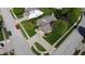 Aerial view of a brick house with well-manicured lawn, driveway, and mature trees at 1232 Severn Ct, Greenwood, IN 46142