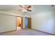 Bedroom with neutral carpet, and entrances to an en-suite bathroom and hallway at 1232 Severn Ct, Greenwood, IN 46142