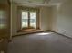 Empty bedroom with neutral walls, soft carpet, and lots of natural light at 1232 Severn Ct, Greenwood, IN 46142