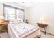 Comfortable bedroom with a large window and carpeted floors at 1232 Severn Ct, Greenwood, IN 46142