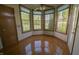 Sunlit breakfast nook with hardwood floors and large windows at 1232 Severn Ct, Greenwood, IN 46142