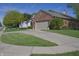 Charming brick home with an attached garage, a well-maintained lawn and flower pots at 1232 Severn Ct, Greenwood, IN 46142