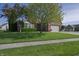 Charming home with a brick facade, attached garage, and a well-kept lawn, showcasing curb appeal at 1232 Severn Ct, Greenwood, IN 46142