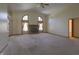 Spacious living room featuring a brick fireplace, vaulted ceilings, and neutral carpeting at 1232 Severn Ct, Greenwood, IN 46142