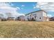 Large backyard, perfect for outdoor activities and gatherings, showcasing the home's exterior at 13750 Hiatt Dr, Carmel, IN 46074