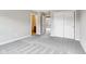 Bedroom showcasing a glimpse into the bathroom, closet, and large window at 13750 Hiatt Dr, Carmel, IN 46074
