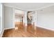 Spacious living room featuring hardwood floors, open layout, and staircase at 13750 Hiatt Dr, Carmel, IN 46074