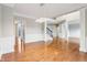 Spacious living room with hardwood floors, recessed lighting, and open floor plan at 13750 Hiatt Dr, Carmel, IN 46074
