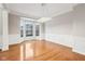 Open living room with hardwood floors, recessed lighting, and large windows at 13750 Hiatt Dr, Carmel, IN 46074