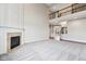Open living room with hardwood floors, fireplace, and staircase at 13750 Hiatt Dr, Carmel, IN 46074