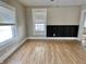 Bedroom featuring a window and a new paneled accent wall at 1640 Bellefontaine St, Indianapolis, IN 46202