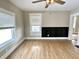 Bedroom with wood floors and a paneled feature wall at 1640 Bellefontaine St, Indianapolis, IN 46202