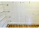 A closet features wood-look floors and wire shelving for ample storage at 1640 Bellefontaine St, Indianapolis, IN 46202