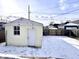 A single-car garage with a side entrance and a window, with a spacious fenced yard at 1640 Bellefontaine St, Indianapolis, IN 46202