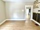 Living room showcases wood-look floors and decorative wall accents at 1640 Bellefontaine St, Indianapolis, IN 46202