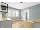 Eat-in kitchen with modern countertops and a sink with stainless steel faucet at 19 Parkview Ave, Indianapolis, IN 46201