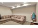 Comfortable finished basement with a plush sectional sofa, perfect for relaxing or entertaining guests at 2071 Eagle Trace Dr, Greenwood, IN 46143