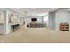Finished basement area with plush carpet and a bar area, perfect for entertaining at 2071 Eagle Trace Dr, Greenwood, IN 46143