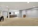 Finished basement with carpet, recessed lighting, and a cozy seating area at 2071 Eagle Trace Dr, Greenwood, IN 46143