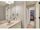 Well lit bathroom with a large mirror, white cabinets, and tile flooring at 2071 Eagle Trace Dr, Greenwood, IN 46143