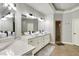 Large bathroom with a double vanity with vessel sinks, large mirrors, and modern lighting fixtures at 2071 Eagle Trace Dr, Greenwood, IN 46143