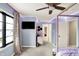 Bedroom features a canopy bed, and TV, illuminated by unique LED lighting at 2071 Eagle Trace Dr, Greenwood, IN 46143