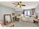 Spacious bedroom with ceiling fan, vanity, large mirror and plenty of light at 2071 Eagle Trace Dr, Greenwood, IN 46143