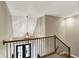 Bright foyer showcasing a spherical chandelier with a staircase and entry doors at 2071 Eagle Trace Dr, Greenwood, IN 46143