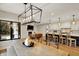 Spacious kitchen and living room space with island and a large dining table at 2071 Eagle Trace Dr, Greenwood, IN 46143