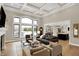 Inviting living room with coffered ceilings, large windows, and hardwood floors at 2071 Eagle Trace Dr, Greenwood, IN 46143