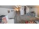 Spacious carpeted attic featuring a closet, artwork, and natural light at 401 E Ohio St, Fortville, IN 46040