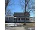 Charming two-story home with front porch and mature trees at 401 E Ohio St, Fortville, IN 46040
