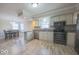 Spacious kitchen with stainless steel appliances and light-toned cabinets at 401 E Ohio St, Fortville, IN 46040