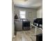 Convenient laundry room equipped with modern washer and dryer units at 401 E Ohio St, Fortville, IN 46040