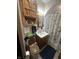 Bathroom featuring updated vanity, medicine cabinet, and tub/shower combo at 504 E Walnut St, Summitville, IN 46070