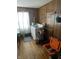 Room featuring washer/dryer hookup, window, and bright light at 504 E Walnut St, Summitville, IN 46070
