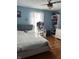 Bedroom featuring natural light from the windows and a spacious closet with built-ins at 720 Mount Rainier Dr, Indianapolis, IN 46217