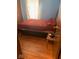 Bedroom featuring a plush-covered bed and a window with natural light at 720 Mount Rainier Dr, Indianapolis, IN 46217