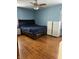 Bedroom with modern decor, hardwood floors, and ample natural light at 720 Mount Rainier Dr, Indianapolis, IN 46217