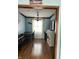 Well-lit dining room featuring hardwood floors and views to living area at 720 Mount Rainier Dr, Indianapolis, IN 46217