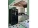 Clean and bright kitchen featuring modern white cabinets and updated black appliances at 720 Mount Rainier Dr, Indianapolis, IN 46217
